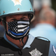 File photo of Chicago police officers standing guard at a “Blue Lives Matter” protest on July 25, 2020 in Chicago, Illinois.